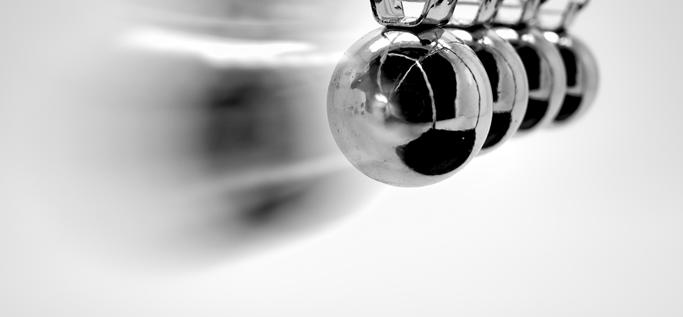 [Header] [About us] [Risk Management] Newton's Cradle